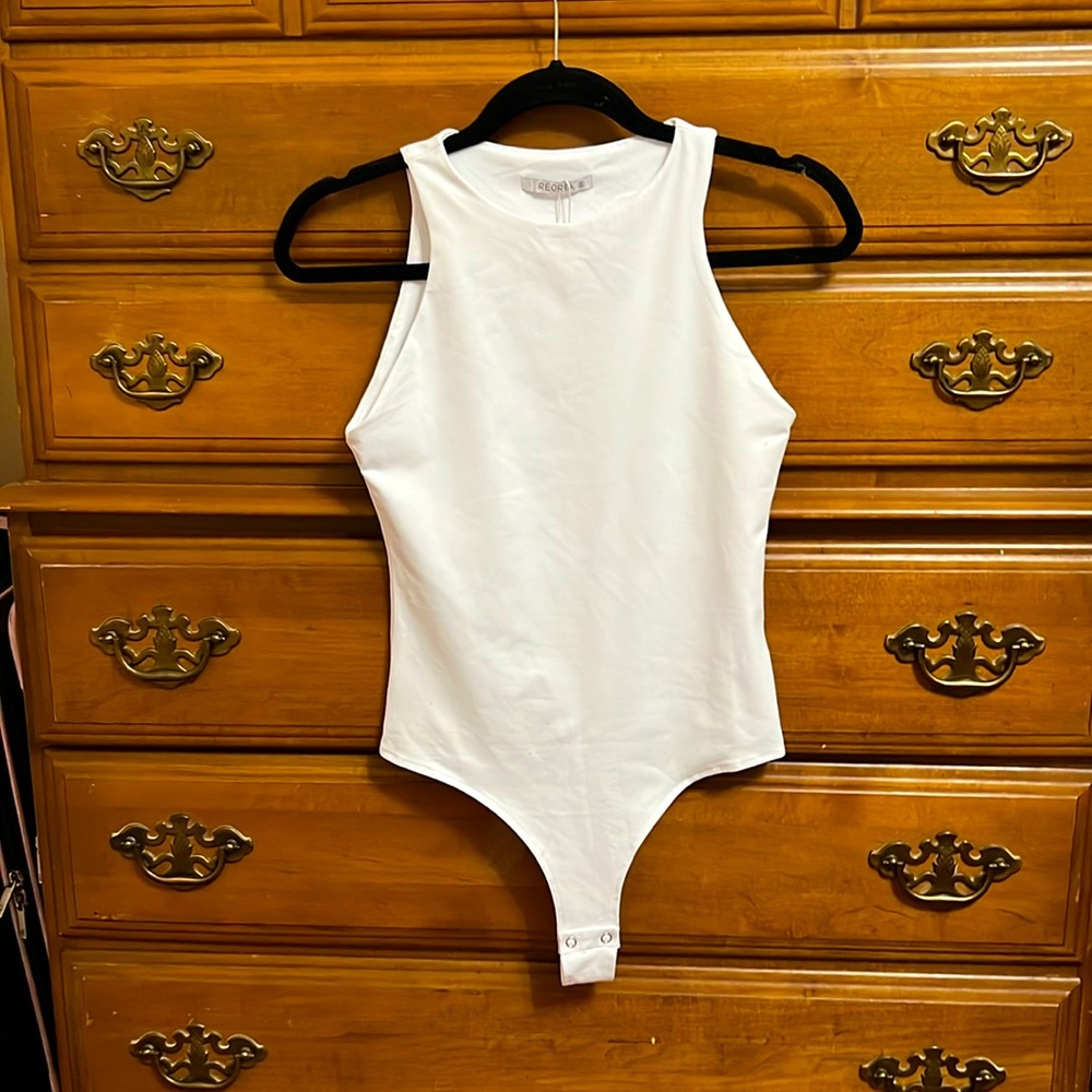 White Bodysuit from Amazon Reoria Brand. Never worn.